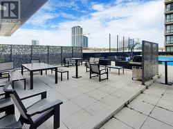 View of patio featuring a city view - 