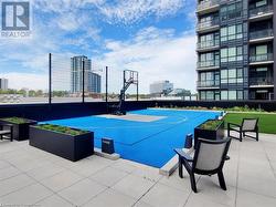 View of sport court with community basketball court and a city view - 