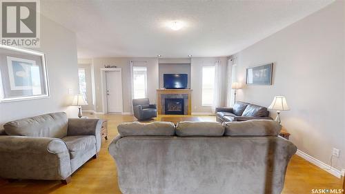 801 13Th Avenue E, Kindersley, SK - Indoor Photo Showing Living Room With Fireplace
