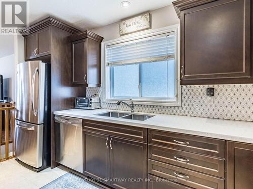 109 Ruby'S Crescent, Wellington North, ON - Indoor Photo Showing Kitchen With Double Sink