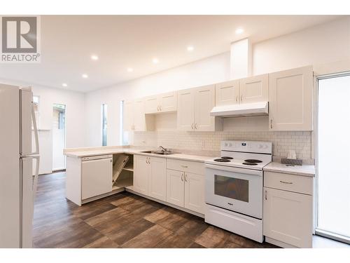 3118 Slocan Park Road, Slocan Park, BC - Indoor Photo Showing Kitchen With Double Sink