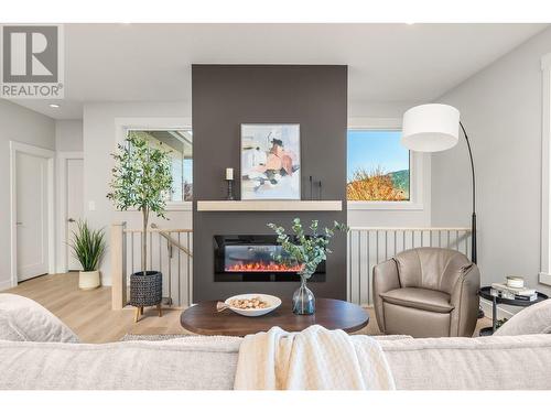 7760 Okanagan Landing Road Unit# 98 Lot# 1, Okanagan Landing, BC - Indoor Photo Showing Other Room With Fireplace
