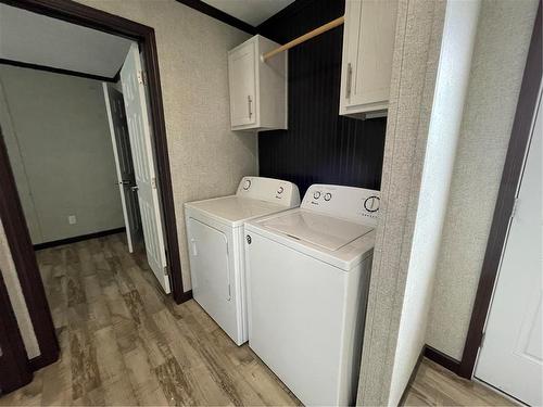 E10 1545 Main Street E, Swan River, MB - Indoor Photo Showing Laundry Room