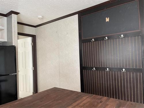 Door leading to Primary bedroom - E10 1545 Main Street E, Swan River, MB - Indoor Photo Showing Other Room