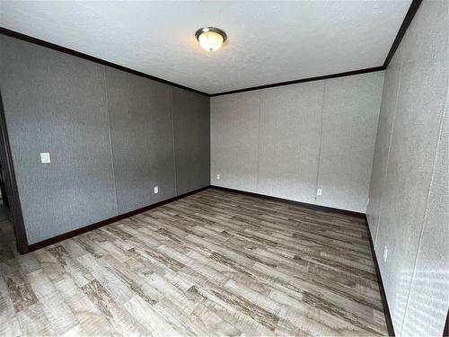 Primary Bedroom - E10 1545 Main Street E, Swan River, MB - Indoor Photo Showing Other Room