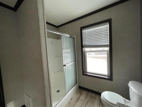 Stand up shower in ensuite - E10 1545 Main Street E, Swan River, MB - Indoor Photo Showing Bathroom