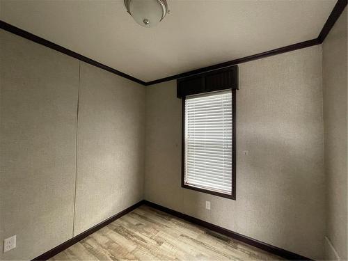 Bedroom #3 - E10 1545 Main Street E, Swan River, MB - Indoor Photo Showing Other Room