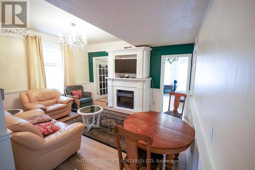 552 Adelaide Street N, London, ON - Indoor Photo Showing Living Room With Fireplace