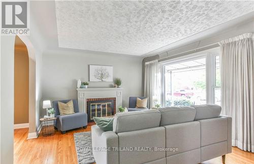 28 Beattie Avenue, London, ON - Indoor Photo Showing Living Room With Fireplace