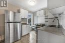 Upper - 129 Grant Avenue, Hamilton, ON  - Indoor Photo Showing Kitchen With Double Sink 