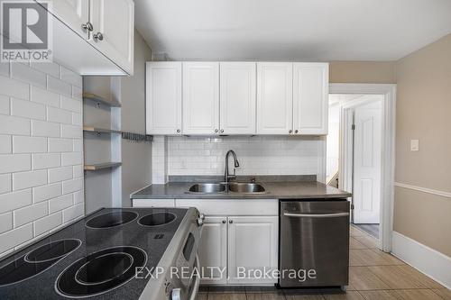 Upper - 129 Grant Avenue, Hamilton, ON - Indoor Photo Showing Kitchen With Double Sink