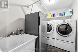 Convenient Main Floor Mud/Laundry Room - 