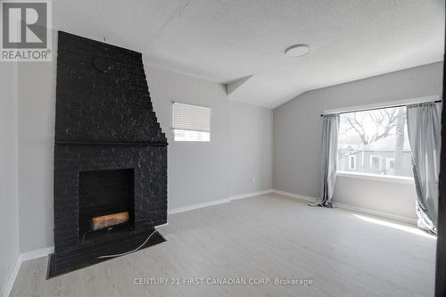 140 Rectory Street, London, ON - Indoor With Fireplace