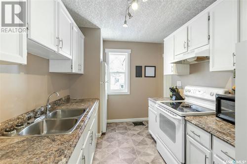 1438 Connaught Street, Regina, SK - Indoor Photo Showing Kitchen With Double Sink