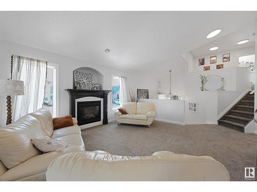 13006 141B Av Nw, Edmonton, AB - Indoor Photo Showing Living Room With Fireplace