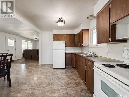 106 1St Street, Gull Lake, SK - Indoor Photo Showing Kitchen With Double Sink