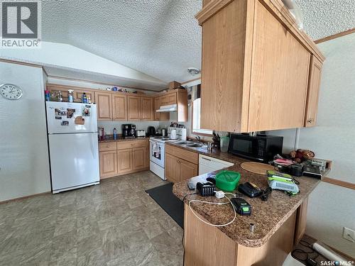 103 5Th Avenue, Chitek Lake, SK - Indoor Photo Showing Kitchen With Double Sink