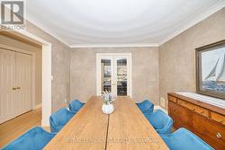 French doors allow entry to the office. - 