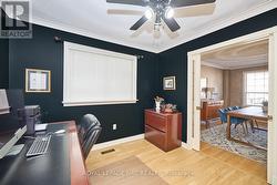 The good sized office on the main floor. - 