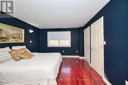 Notice the beautiful cherry hardwood floor! - 