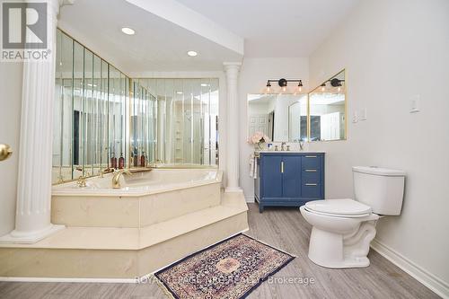Ensuite privy to the 4-piece bathroom. - 12 Brigantine Court, St. Catharines (Port Weller), ON - Indoor Photo Showing Bathroom