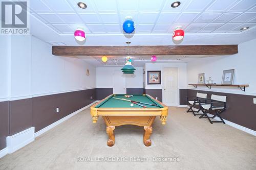 Enjoy a good time with family and friends. - 12 Brigantine Court, St. Catharines (Port Weller), ON - Indoor Photo Showing Other Room