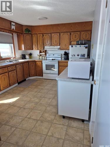 Gonsch Acreage, Longlaketon Rm No. 219, SK - Indoor Photo Showing Kitchen With Double Sink