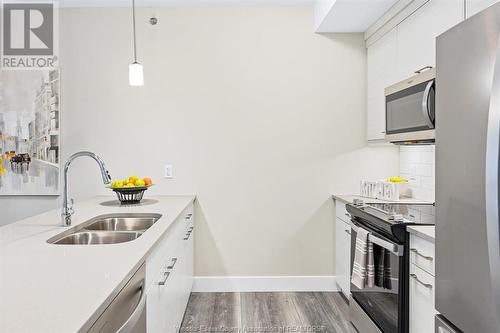 190 Main Street East Unit# 410, Kingsville, ON - Indoor Photo Showing Kitchen With Double Sink