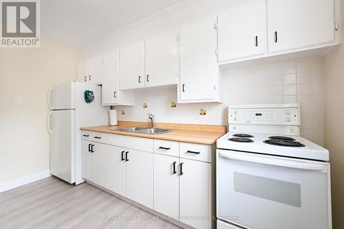 11 - 2418 New Street, Burlington, ON - Indoor Photo Showing Kitchen With Double Sink