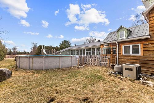 Face arrière - 696 Route 202 E., Hemmingford - Canton, QC - Outdoor With Above Ground Pool