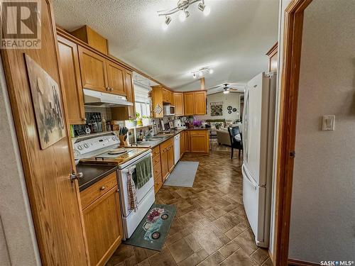 107 May Street, Neudorf, SK - Indoor Photo Showing Kitchen With Double Sink