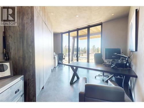 Fourth bedroom with Murphy bed and outdoor access - 4275 Todd Road, Kelowna, BC - Indoor Photo Showing Office