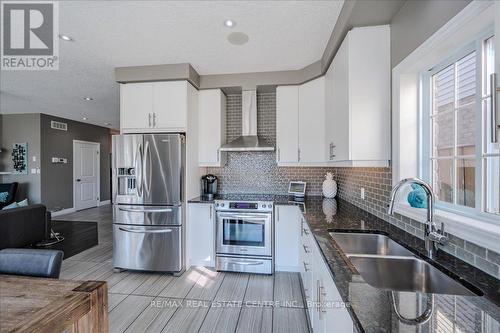 932 Eden Oak Court, Kitchener, ON - Indoor Photo Showing Kitchen With Double Sink With Upgraded Kitchen