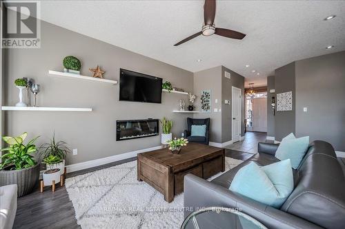 932 Eden Oak Court, Kitchener, ON - Indoor Photo Showing Living Room With Fireplace