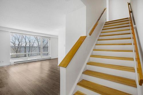 Staircase - 320-150 Rue Berlioz, Montréal (Verdun/Île-Des-Soeurs), QC - Indoor Photo Showing Other Room