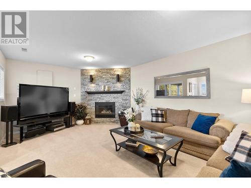 7115 Tronson Road, Vernon, BC - Indoor Photo Showing Living Room With Fireplace