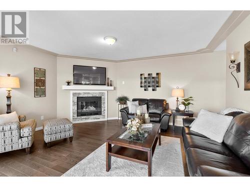 7115 Tronson Road, Vernon, BC - Indoor Photo Showing Living Room With Fireplace