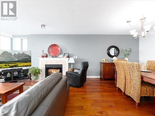 12C 328 Taylor Way, West Vancouver, BC - Indoor Photo Showing Living Room With Fireplace