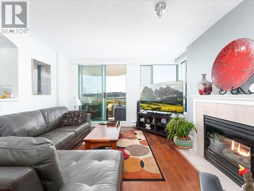 12C 328 Taylor Way, West Vancouver, BC - Indoor Photo Showing Living Room With Fireplace