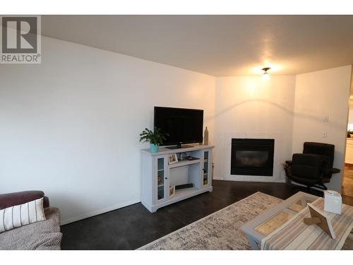 1245 Abbott Drive, Quesnel, BC - Indoor Photo Showing Living Room With Fireplace
