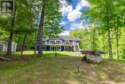 View of lot and lake home from lake - 