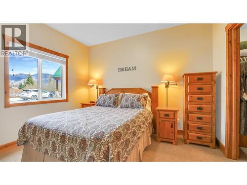 701 14A Crescent Unit# 111H, Invermere, BC - Indoor Photo Showing Bedroom