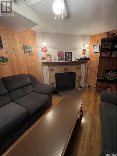 35 Acres South, Hudson Bay Rm No. 394, SK - Indoor Photo Showing Living Room With Fireplace