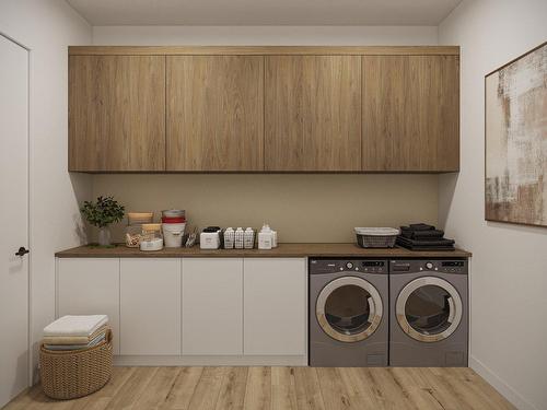 Salle de lavage - 87  - 89 Rue Des Merisiers, Saint-Sauveur, QC - Indoor Photo Showing Laundry Room