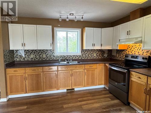 210 Bouvier Crescent, Beauval, SK - Indoor Photo Showing Kitchen With Double Sink