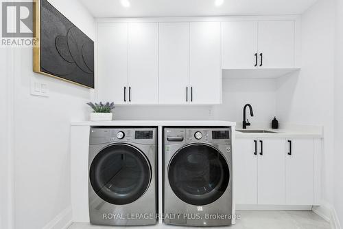 Custom Laundry with Counter Space - 4344 Dallas Court, Mississauga, ON - Indoor Photo Showing Laundry Room