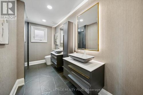 Textured Tiles, Mirrors with Under Light - 4344 Dallas Court, Mississauga, ON - Indoor Photo Showing Bathroom