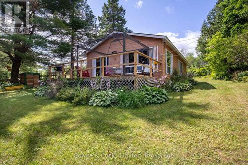 mature gardens - 197 King Road W, Wollaston, ON - Outdoor With Deck Patio Veranda