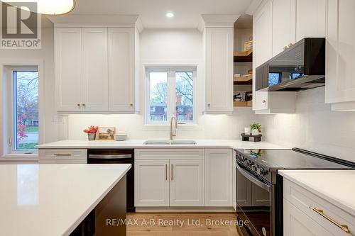 7 Nelson Street, West Perth (Mitchell), ON - Indoor Photo Showing Kitchen With Double Sink