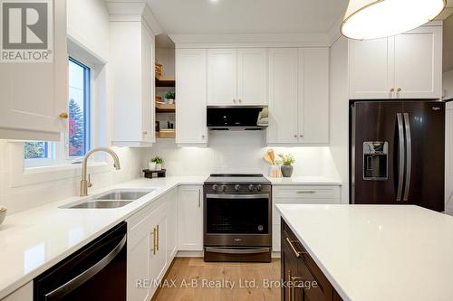 7 Nelson Street, West Perth (Mitchell), ON - Indoor Photo Showing Kitchen With Double Sink With Upgraded Kitchen